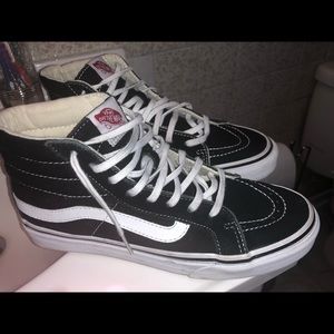 black high top vans.